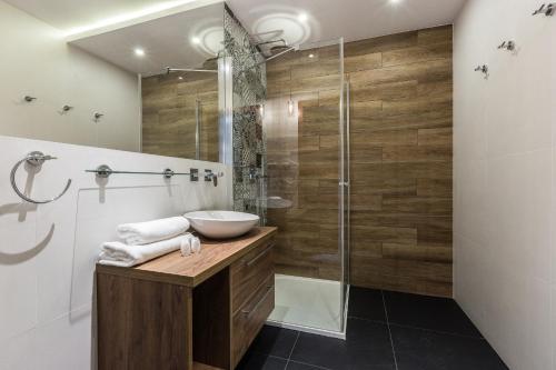 Koupelna v ubytování Aparthotel Góralski Spa & Restaurant