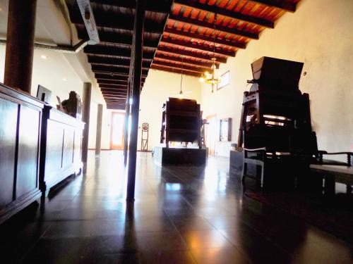 a large room with a room with furniture and a room with a room at Hotel La Cautiva de Ramirez in La Paz