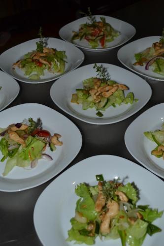 a group of plates of food on a table at Negril Sky Blue Resorts LTD in Negril