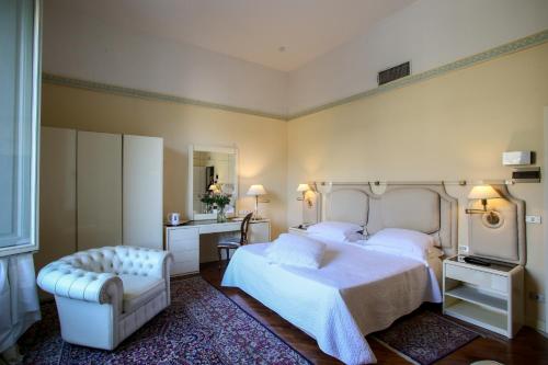 Postel nebo postele na pokoji v ubytování Grand Hotel Tettuccio