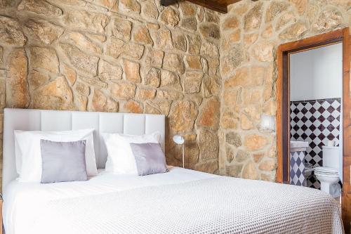 Cama ou camas em um quarto em Casa Da Padeira - Turismo Rural