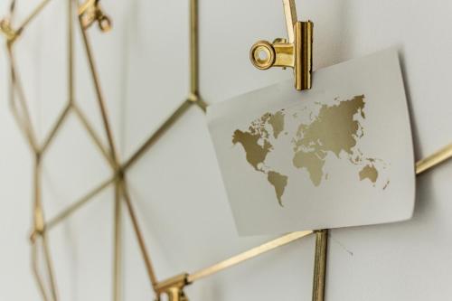 a map of the world hanging on a wall at BeSalamanca in Salamanca
