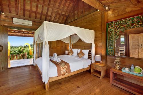 Un ou plusieurs lits dans un hébergement de l'établissement Ti Amo Bali