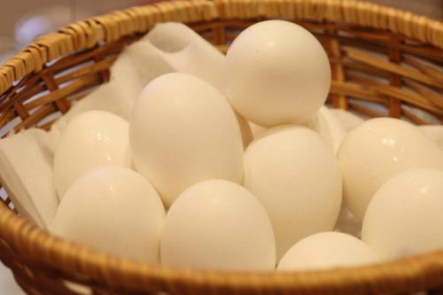 a basket filled with white eggs at GRG Hotel Naha Higashimachi in Naha