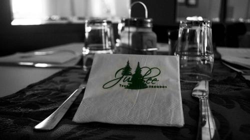 a table with a napkin on top of a table at Jubilee Hotel Troodos in Troodos