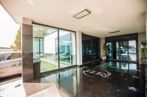 a living room with a car on the floor at Hotel Relax Roma Nord in Fiano Romano