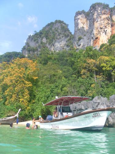 a group of people on a boat in the water at Melina Beach Front Bungalows in Tha Lane Bay