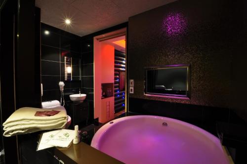 Kylpyhuone majoituspaikassa Jin Spa Resort Hotel