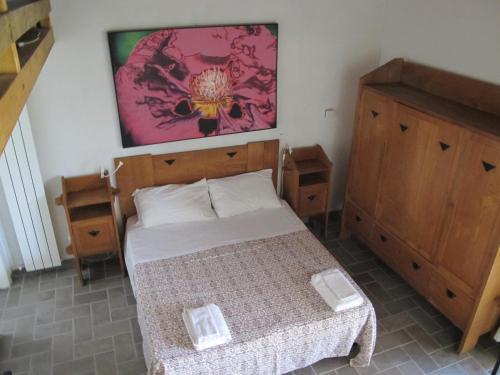 Postel nebo postele na pokoji v ubytování Orto delle Fate