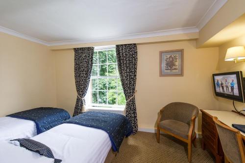 Katil atau katil-katil dalam bilik di Prince Rupert Hotel
