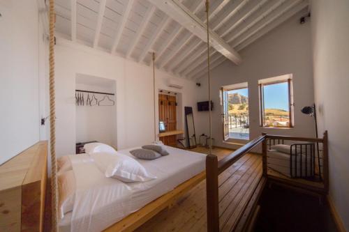 A bed or beds in a room at Villa Myrto
