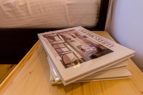 a book sitting on top of a table at Villa Myrto in Líndos