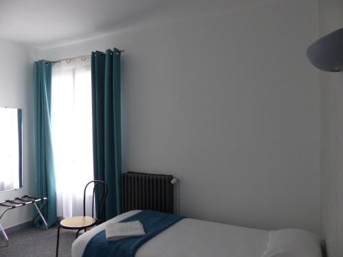 Postel nebo postele na pokoji v ubytování Hotel La Belle Etoile