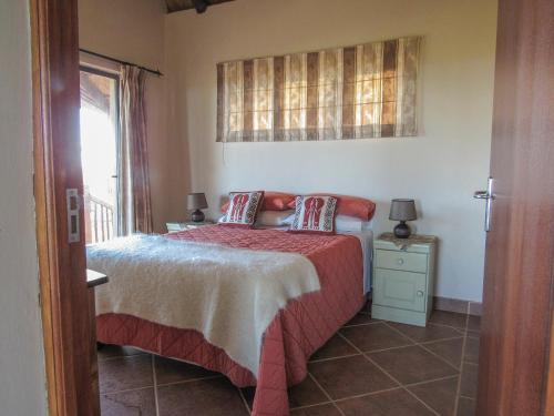 Ein Bett oder Betten in einem Zimmer der Unterkunft Pomeroy Lodges