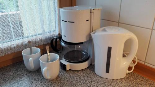 Plateau bouilloire dans l'établissement Apartment Enzian