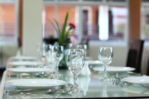 Un restaurante u otro lugar para comer en Immana Grand Inle Hotel