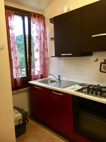 Kuchyň nebo kuchyňský kout v ubytování Residence IL PODERE