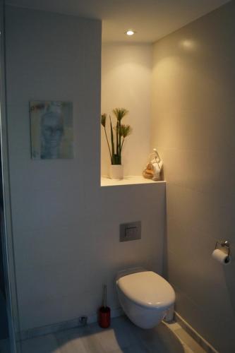 Ett badrum på Costabella Penthouse