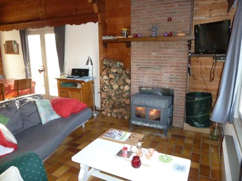 A television and/or entertainment centre at Chalet Pimpernel