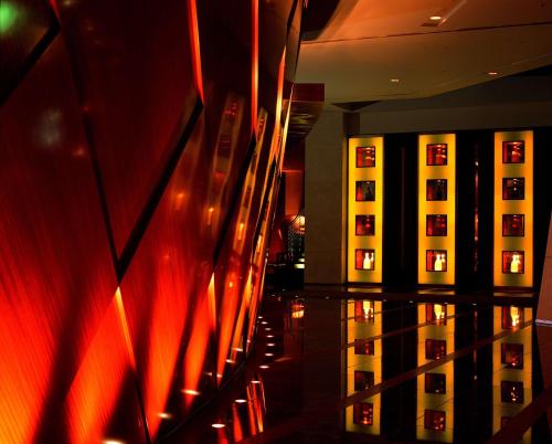 a row of servers in a room with red lights at Grand Hyatt Tokyo in Tokyo