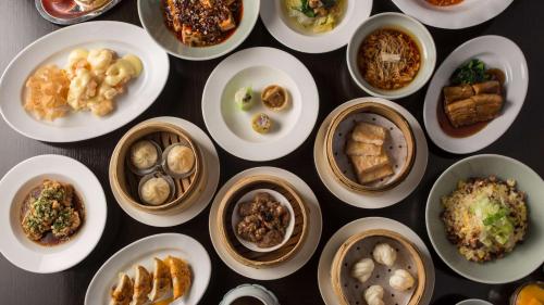 a group of plates of food on a table at Grand Hyatt Tokyo in Tokyo