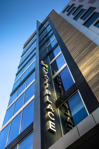 a tall building with a sign on the side of it at Hyatt Place Washington D.C./National Mall in Washington