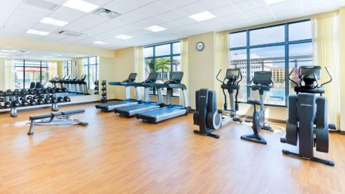 a gym with treadmills and elliptical machines at Hyatt Place Boca Raton in Boca Raton
