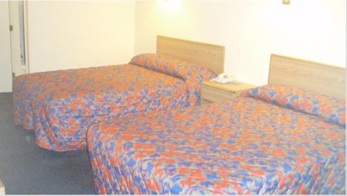 Cama o camas de una habitación en Pawnee Inn