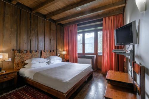 Voodi või voodid majutusasutuse Country hotel Gladenkaya toas