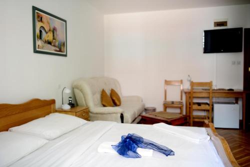 Katil atau katil-katil dalam bilik di Hotel Sanja former Oliva