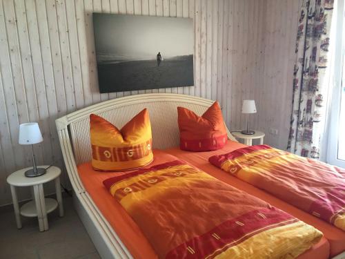 Katil atau katil-katil dalam bilik di Gutspark Schwarbe mit Reiterhof - Ferienhaus 3