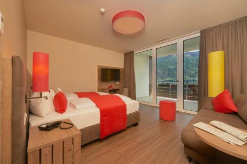 Llit o llits en una habitació de Hotel Gantkofel