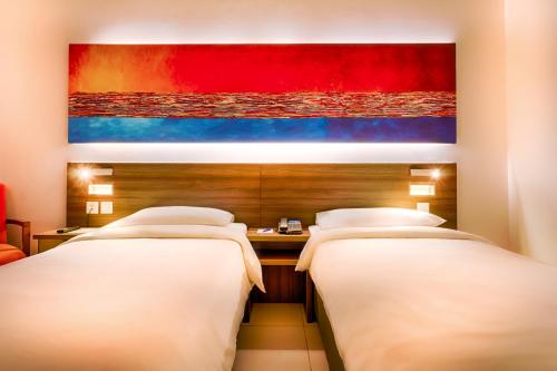 En eller flere senge i et værelse på Citymax Hotel Al Barsha at the Mall