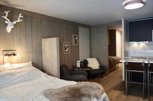 Rúm í herbergi á Little Suite Val d'Isère
