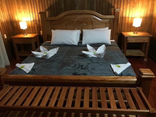 Ένα ή περισσότερα κρεβάτια σε δωμάτιο στο Tenamit Maya