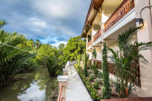 a view of a river from a building at Oh Amphawa Boutique Resort in Amphawa