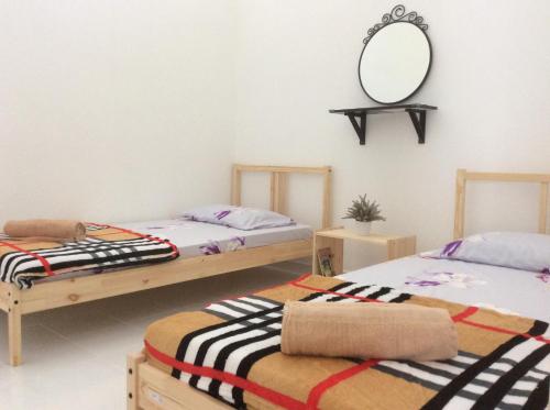 Krevet ili kreveti u jedinici u okviru objekta Laman Hanaz - Changloon