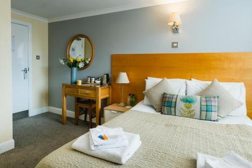 Кровать или кровати в номере George Oxford Hotel