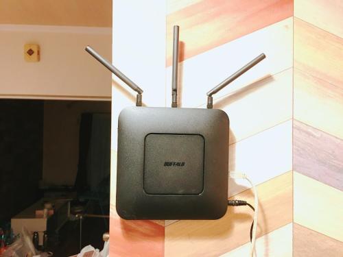 a television sitting on top of a counter at Guest House Fukuoka W001 in Kasuga