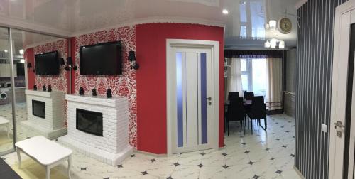 TV a/nebo společenská místnost v ubytování Apartment on Yushchenka 5