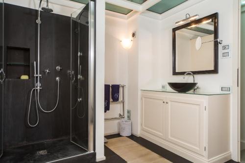 a bathroom with a shower and a sink at Villa La Fornace in Tavarnelle in Val di Pesa