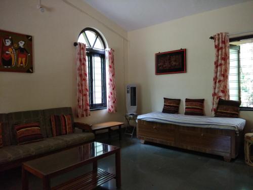 Ένα ή περισσότερα κρεβάτια σε δωμάτιο στο Nivaant @ Vicharays