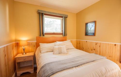 Postel nebo postele na pokoji v ubytování Cavendish Lodge & Cottages