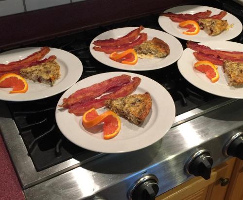 a group of plates of food on a stove at Lyndon House Bed & Breakfast in Lexington