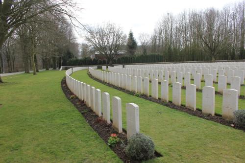 a row of white fences in a park at Old Saxo in Ypres