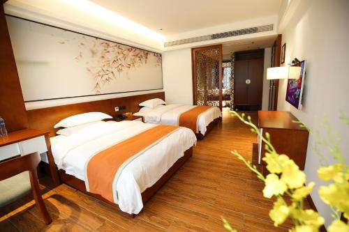 Ένα ή περισσότερα κρεβάτια σε δωμάτιο στο All Seasons Lodge Breakfast&Lift&Free Laundry and English Service