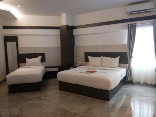 Katil atau katil-katil dalam bilik di Seventeen Hotel