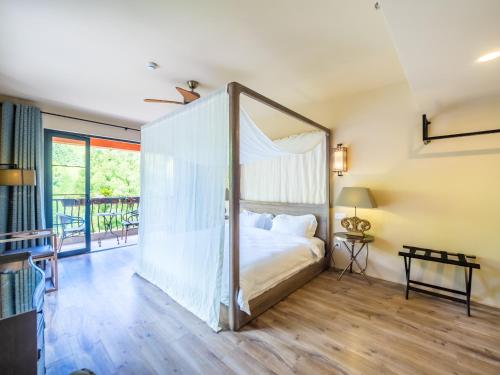 Postel nebo postele na pokoji v ubytování Moganshan Arcadia Resorts
