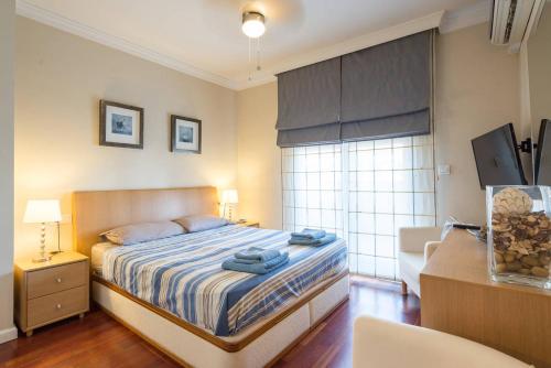 Postel nebo postele na pokoji v ubytování Penthouse Rincón