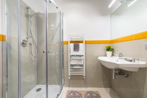a bathroom with a shower and a sink at Cerea BnB in Turin